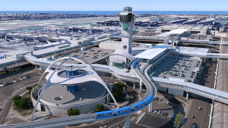Aerial view of Los Angeles International Airport with the Theme Building and control tower