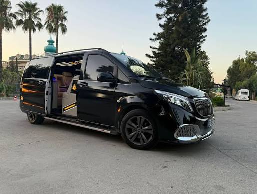 Mercedes-Benz V-Class with open door revealing a light leather interior
